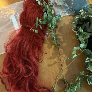Poison Ivy costume with wig, tights, and extra leaves for emphasis.
